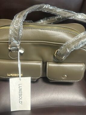 Brown Satchel with Dual Front Pockets and Gold Hardware